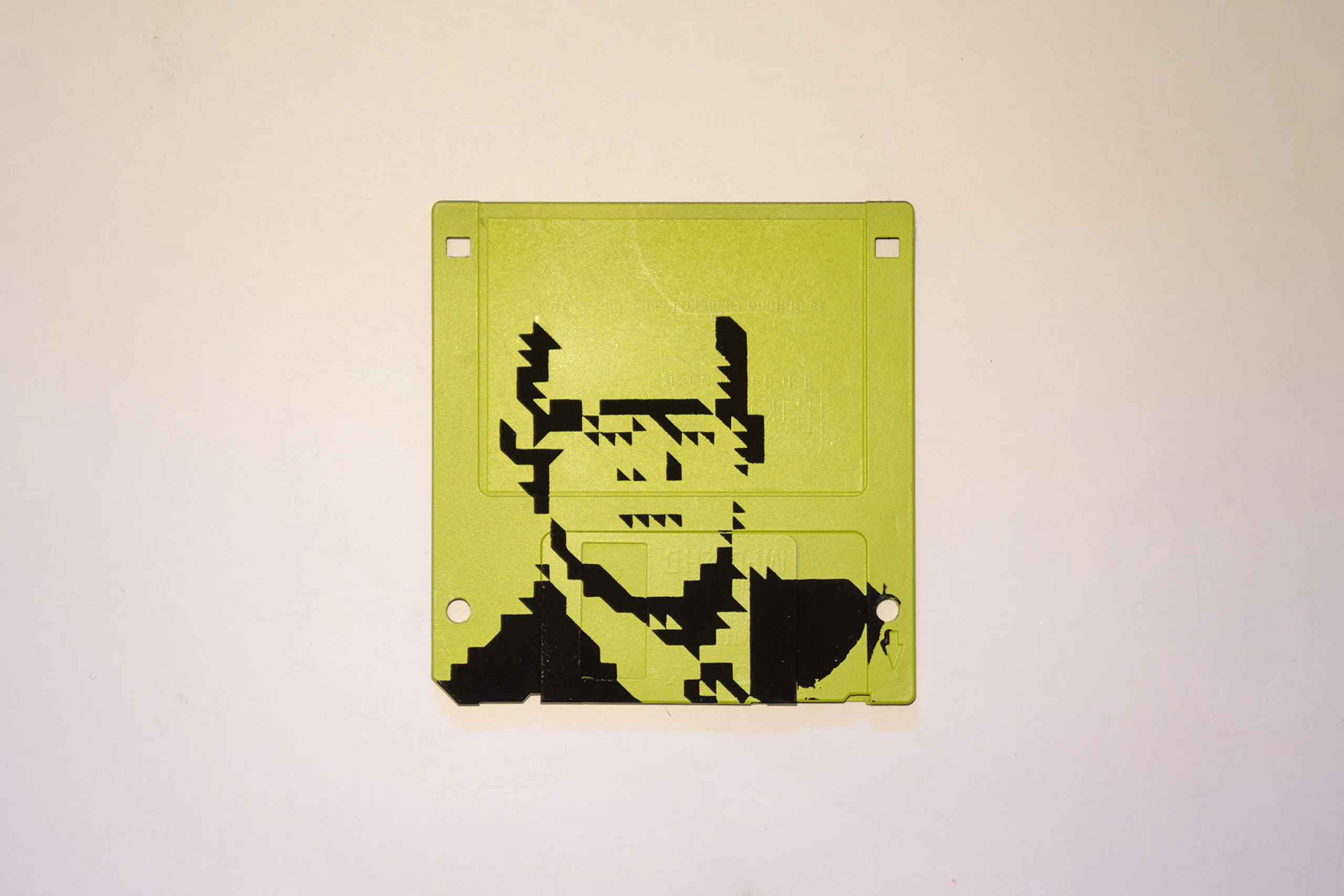 Silkscren of Klaus on a 3.5" floppy disk. Contemporary artwork- light green version