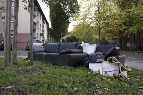 Furniture and crap thrown away on the street at Essen Südviertel Furniture and crap thrown away on the street at Essen Südviertel