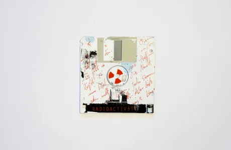 Atomic power, or nuclear power plants, are obsolete - silk screened on 3.5" floppy disk Atomic power, or nuclear power plants, are obsolete - silk screened on 3.5" floppy disk