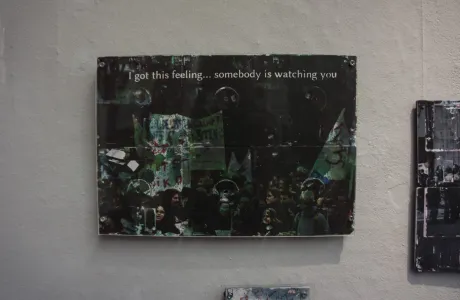 sombody is watchin you - protest image on 3.5" floppy disk sombody is watchin you - protest image on 3.5" floppy disk